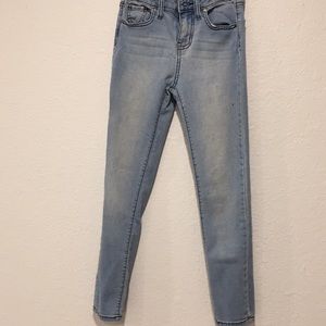 Light blue denim jeans.